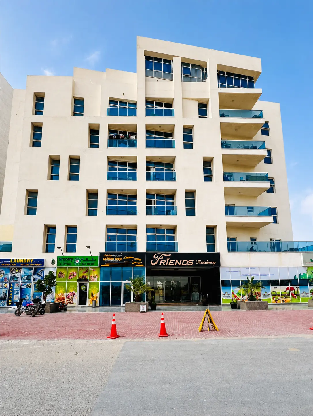 Friends Residency Building exterior in Dubai, representing the property information needed for a facility management quotation