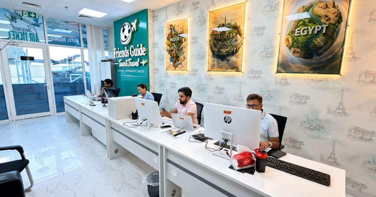 Friends Guide Travel office team assisting travelers in Dubai.